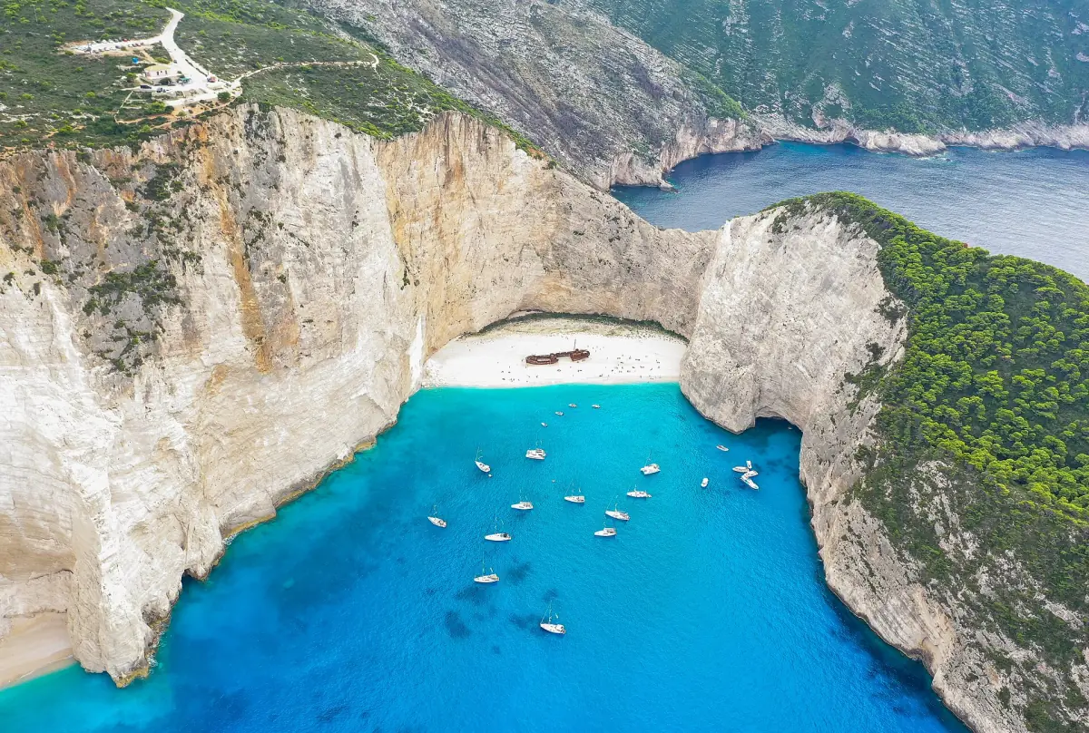 Aerial view of the bay with boats and the beach